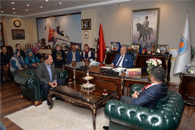 Şehit Ailelerinden Büyükşehir Belediye Başkanı Burhanettin Kocamaz’a Ziyaret