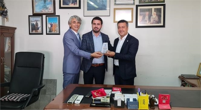 Tarsus Ticaret Borsası İhracat ve Yatırımlarını Arttırmaları Nedeniyle Ateşler Bakliyat'a Plaket Takdim Etti