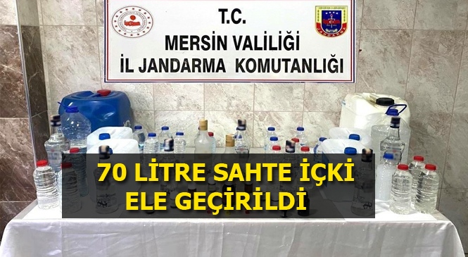 Mersin'de Sahte İçki Operasyonunda 1 Kişi Gözaltına Alındı, 70 Litre Sahte Alkol Ele Geçirildi