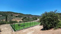 Demirci’de 11 kırsal mahalleye halı saha yatırımı