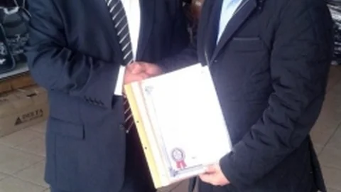 Oto Tamirciler Odası Başkanı Bucak'a “Uyumlu Mükellef” Belgesi