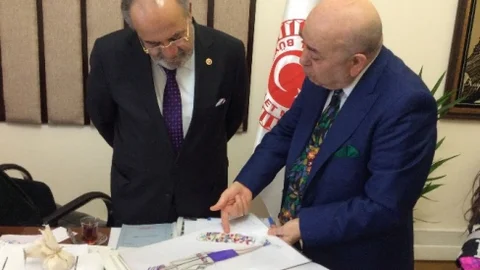 Ahmet Özceyhan'dan Uslu'ya Ziyaret