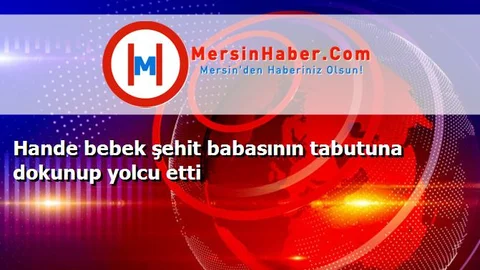 Hande bebek şehit babasının tabutuna dokunup yolcu etti