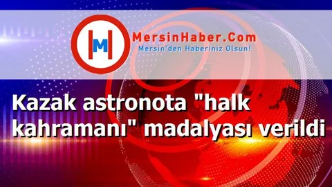 Kazak astronota "halk kahramanı" madalyası verildi