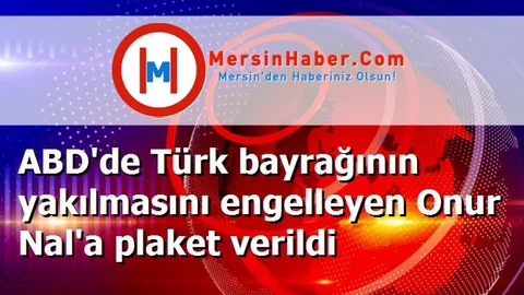 ABD'de Türk bayrağının yakılmasını engelleyen Onur Nal'a plaket verildi