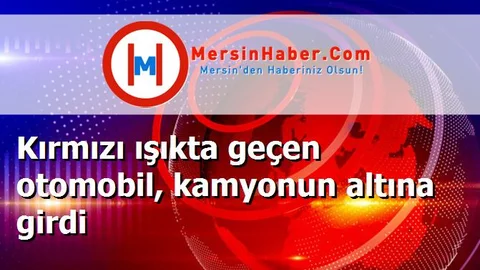 Kırmızı ışıkta geçen otomobil, kamyonun altına girdi
