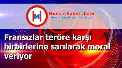 Fransızlar teröre karşı birbirlerine sarılarak moral veriyor