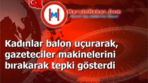 Kadınlar balon uçurarak, gazeteciler makinelerini bırakarak tepki gösterdi
