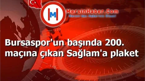 Bursaspor'un başında 200. maçına çıkan Sağlam'a plaket