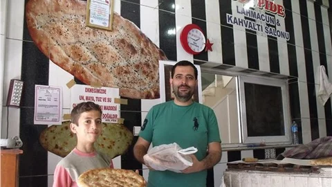 TARSUS'TA  ASKIDA EKMEK UYGULAMASI