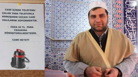 Camide Telefonla Konuşana Halı Temizleme Cezası
