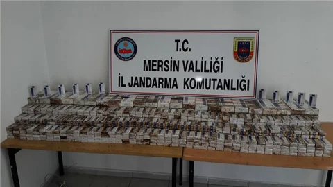 Adana Tarsus Otoyolunda Yanmaktan Kurtarılan TIR'dan Kaçak Sigara Çıktı