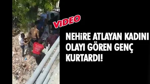 Suya Atlayan Genç Adam, Kadını Su Yüzeyinde Tuttu