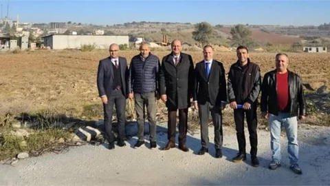 KAYMAKAM AKYÜZ, AYDOĞAN AİLESİNİN YAPTIRACAĞI OKUL YERİNI İNCELEDİ