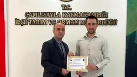 KAYMAKAM AVCI'DAN ZİRAAT YÜKSEK MÜHENDİSİ ASLAN'A BAŞARI BELGESİ
