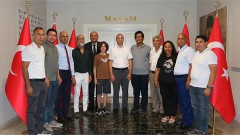 KAYMAKAM AKYÜZ, ŞAMPİYONLARI AĞIRLADI