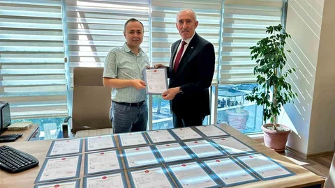 Kayseri'de KESOB konut projesinde tapular alındı