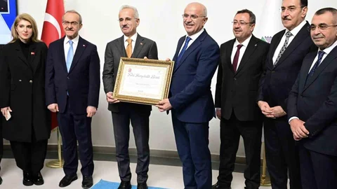 Başkan Er'den Uraloğlu'na Beratı Takdim Edildi