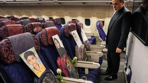 İran Heyetinin Uçağında Çocukların Fotoğrafları Yer Aldı