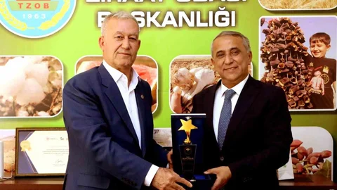 Hasan Altun'dan Teşekkür Plaketi
