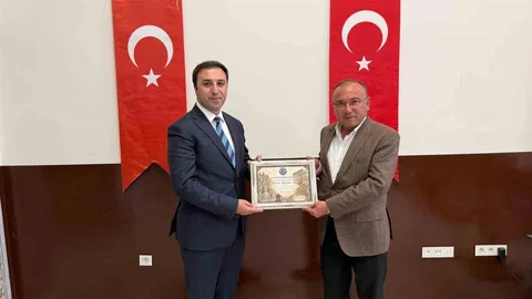 Çavdarhisar Kaymakamı'na Fahri Hemşehrilik Beratı Verildi