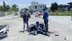 Antalya Manavgat'ta Motosiklet Kazasında Yaralı Arkadaşına Güneşlikle Koruma Sağladılar