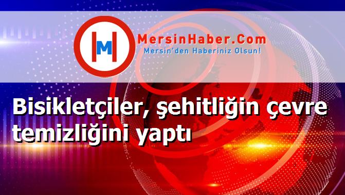 Bisikletçiler, şehitliğin çevre temizliğini yaptı