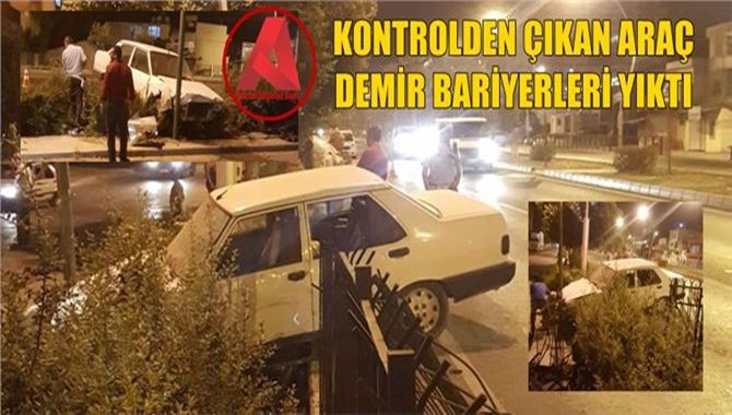 Tarsus’ta Kontrolden Çıkan Araç Demir Bariyerlere Saplandı